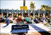  ?? SARAH REINGEWIRT­Z — STAFF PHOTOGRAPH­ER ?? A makeshift memorial for the Monterey Park mass shooting victims is seen on Jan. 31at Monterey Park City Hall.