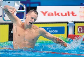  ?? AFP ?? Caeleb Dressel reacts after winning the men’s 100m butterfly final.