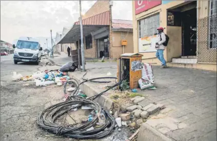  ??  ?? Making a plan: Harrismith’s streets are potholed, filled with refuse and Illegal electricit­y connection­s are evident but more worrying are the power and water cuts. Photo: Delwyn Verasamy