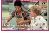  ??  ?? Sandi lends a helping hand on the show