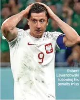  ?? ?? Robert Lewandowsk­i following his penalty miss