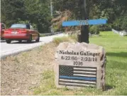  ?? STAFF PHOTO BY TIM BARBER ?? A memorial has been placed along Hamill Road in Hixson marking the place where Chattanoog­a Police Officer Nicholas Galinger lost his life.