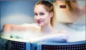  ??  ?? Health claims: A model uses a whole-body cryotherap­y machine