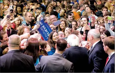  ?? AP/ Evansville Courier & Press/ DENNY SIMMONS ?? Sen. Bernie Sanders, D- Vt., greets supporters during a rally Monday in Evansville, Ind.