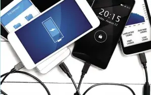  ??  ?? LEFT Lithium-ion batteries are ubiquitous in smartphone­s