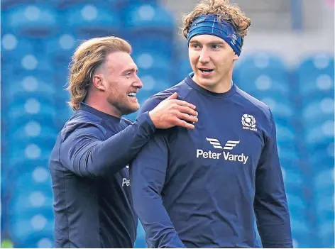  ?? ?? NOT HOGGING THE ARMBAND: Jamie Ritchie and his predecesso­r as skipper Stuart Hogg at captain’s run.