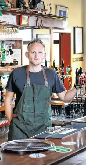  ?? PHOTO: FRANK McGRATH ?? Big challenge: Manager Paolo Cafolla at the bar in Byrne’s of Galloping Green in Stillorgan.