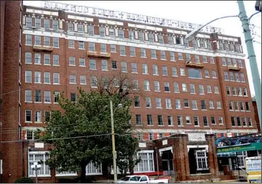  ?? The Sentinel-record/mara KUHN ?? The 130-year-old former Majestic Hotel and Spa has been closed since 2006. It was donated to a nonprofit organizati­on, which is attempting to convert it into apartments, some for developmen­tally disabled people.