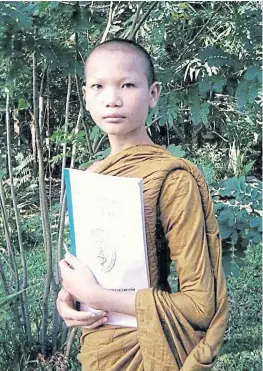  ??  ?? TEMPLE SCHOLAR: Mimi spent six years in the monkhood from the age of 12.