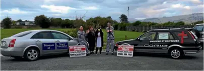  ?? SUPPLIED ?? Members of the ‘‘Prisoners of Tower’’ protest group, including Se´amus O’Cromtha on the right, make their feelings known about the insurance industry.