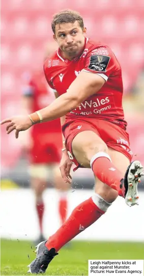  ??  ?? Leigh Halfpenny kicks at goal against Munster. Picture: Huw Evans Agency.