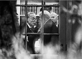  ?? ALEX WONG/GETTY ?? Senate Minority Leader Chuck Schumer, left, makes a point to President Donald Trump in the Oval Office. “Today was a good day in a generally very partisan town,” Schumer said.