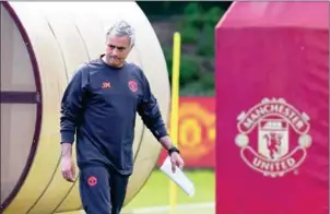  ?? PAUL ELLIS/AFP ?? Manchester United manager Jose Mourinho arrives at training yesterday on the eve of their UEFA Europa League final with Ajax.