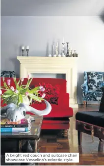  ??  ?? A bright red couch and suitcase chair showcase Vesselina’s eclectic style.
