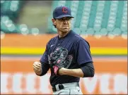  ??  ?? Cleveland Indians starting pitcher Shane Bieber struck out 12 in six innings in a 3-2 loss to the TIgers in the season opener on Thursday at Detroit.