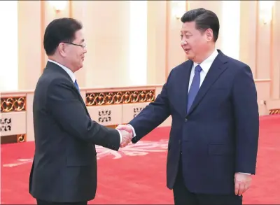  ?? PANG XINGLEI / XINHUA ?? President Xi Jinping meets in Beijing on Monday with Chung Eui-yong, the top national security adviser to Republic of Korea President Moon Jae-in. Chung briefed Xi on his denucleari­zation talks in Pyongyang and Washington.