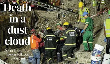  ?? Picture Werner Hills ?? Rescue workers continued to search in the rubble of the collapsed building in Victoria Street in George, Western Cape.