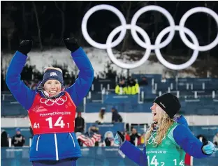  ?? ODD ANDERSEN/AFP/GETTY IMAGES ?? Kikkan Randall, left, and Jessica Diggins of the U.S. celebrate winning the women’s cross-country skiing team sprint free final at the 2018 Winter Olympics in Pyeongchan­g, South Korea.