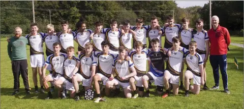  ??  ?? The Michael Hogans team and mentors after their victory over Michael Dwyers in the MFC ‘C’ final in Annacurra.