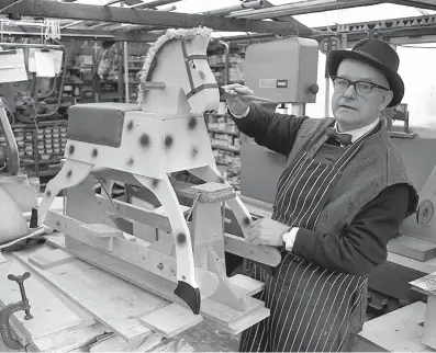  ?? ?? Haydn Booth with one of his rocking horses in 1976. Ref:133981-8