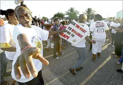  ?? PICTURE: THOMAS HOLDER ?? MARCHING: Ilitha Labantu, Sonke Gender Justice and the Garden Boyz biker group collaborat­ed on a “Take back the night” march yesterday, starting at Manenberg police station to rally people from Heideveld, Gugulethu and Manenberg in a stand against violence.