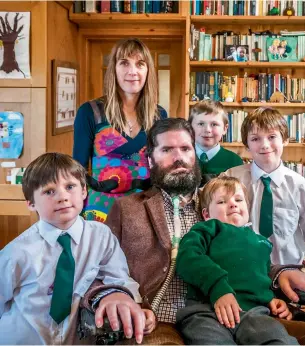  ??  ?? Right, from top: Ruth with her husband Simon and their children (clockwise from left) Arden, seven, Raife, nine, Jack, 11, and twins Hunter and Sadie, four; a picture of Arden as a baby with ‘Dadda’, and Ruth and her Tragic Wives Swimming Club