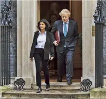  ??  ?? Mirza with Boris Johnson in December