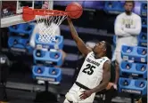  ?? MICHAEL CONROY — THE ASSOCIATED PRESS ?? Colorado guard McKinley Wright IV shoots against Georgetown in the second half of their first-round game in the NCAA Tournament on Saturday at Hinkle Fieldhouse in Indianapol­is.