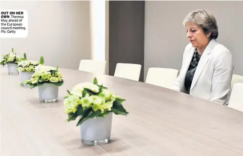  ??  ?? OUT ON HER OWN Theresa May ahead of the European council meeting. Pic: Getty