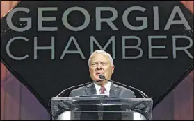  ?? BOB ANDRES / BANDRES@AJC.COM ?? Gov. Nathan Deal makes his remarks at The Georgia Chamber’s annual Eggs & Issues breakfast. Also on hand were Lt. Gov. Casey Cagle, and House Speaker David Ralston.