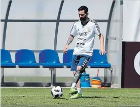 ?? GABRIEL ROSSI GETTY IMAGES ?? Lionel Messi of Argentina warms up at Stadium of Syroyezhki­n sports school Wednesday in Bronnitsy, Russia. Argentina plays France in the knockout stage of soccer’s World Cup on Saturday.