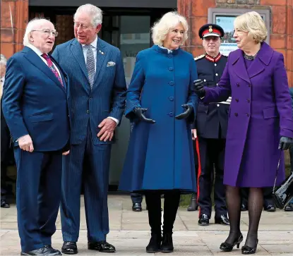  ??  ?? Welcome: Michael D Higgins, Prince Charles, his wife Camilla and Sabina Higgins in Liverpool