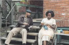  ??  ?? Denzel Washington and Viola Davis reprise their Broadway roles as Troy and Rose Maxson in “Fences.” Photo by David Lee, provided by Paramount Pictures