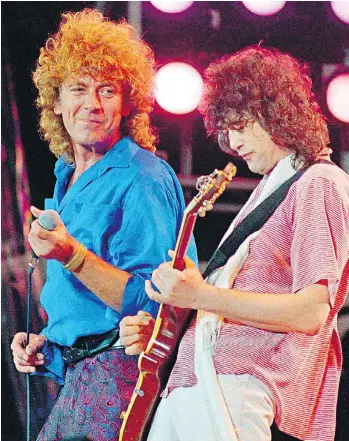  ?? AMY SANCETTTA/AP PHOTO ?? Led Zeppelin’s Robert Plant, left, and Jimmy Page, shown here at 1985’s Live Aid concert, face a new trial in a lawsuit accusing them of copying another song for the intro to Stairway to Heaven.