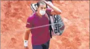  ?? REUTERS ?? Two-time French Open runner-up Dominic Thiem walks off the court after losing his first round match to Pablo Andujar.