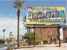  ?? Mario Tama / Getty Images ?? Planned Parenthood of the Pacific Southwest’s Rancho Mirage (Riverside County) billboard touts California’s abortion access.