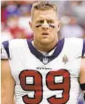  ?? AP ?? J.J. Watt dominates second half, but new Giant line does its job.