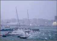  ?? (AP/NTB Scanpix/Per-Inge Johnsen) ?? Boats are shown during extreme weather on Thursday in the harbour of Bodø, Northern Norway.