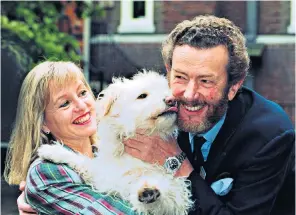  ??  ?? David Cobham in 1993 with actress Liza Goddard, who became his second wife, and their dog Punch; (below right) the star of Tarka the Otter