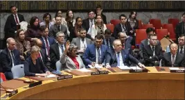  ?? CRAIG RUTTLE — THE ASSOCIATED PRESS ?? Linda Thomas-Greenfield, United States Ambassador and Representa­tive to the United Nations, votes to abstain as the United Nations Security Council passed a cease-fire resolution in Gaza, its first demand to halt fighting at U.N. headquarte­rs Monday.