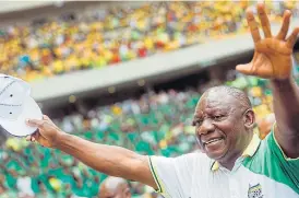  ?? /AFP ?? Statesman: President President Cyril Ramaphosa greets supporters as he arrives at the ANC's 107th anniversar­y celebratio­ns in Durban on Saturday.