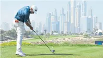  ?? ?? Towering ambition: Lee Westwood tees off on the eighth hole during yesterday’s second round at the Dubai Desert Classic