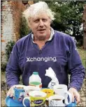  ??  ?? Boris offers tea to reporters