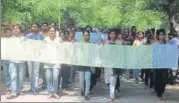  ?? HT PHOTO ?? Girl students taking out a silent protest march on Sunday.