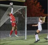  ?? FRANK GAMBATESE — FOR THE MORNING JOURNAL ?? Bay goalkeeper Maeve Johnston stops a shot against Lake Catholic on Nov. 8 in a Division II state semifinal at Nordonia High School.