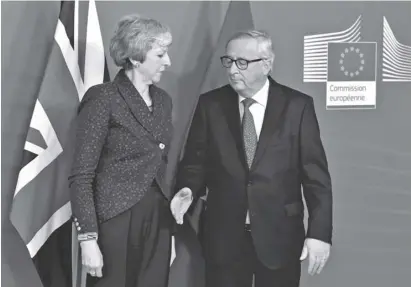  ?? Photo DPA ?? Long faces for Theresa May and Jean Claude Juncker as they met in Brussels yesterday (Thursday).