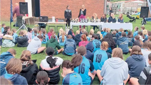  ?? ?? Chairwoman Imogen Scott and Maidenhead United Women's player Alesha Lunn handed out awards and trophies at Wargrave Women and Girls FC's end of season awards event.