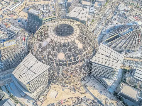  ?? EXPO 2020 VIA REUTERS ?? An aerial view taken after the recent crowning of Al Wasl Dome shows the progress of constructi­on at the Expo 2020 site in Dubai, United Arab Emirates in this undated picture obtained on September 19, 2019.