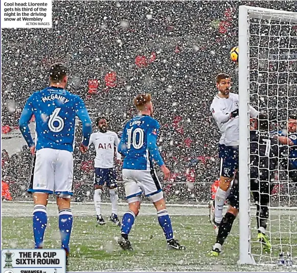  ?? ACTION IMAGES ?? Cool head: Llorente gets his third of the night in the driving snow at Wembley