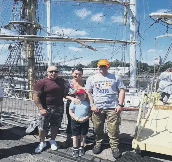  ??  ?? Jacob, waiting for his adveture to begin, and his family at the Tall Ships event.